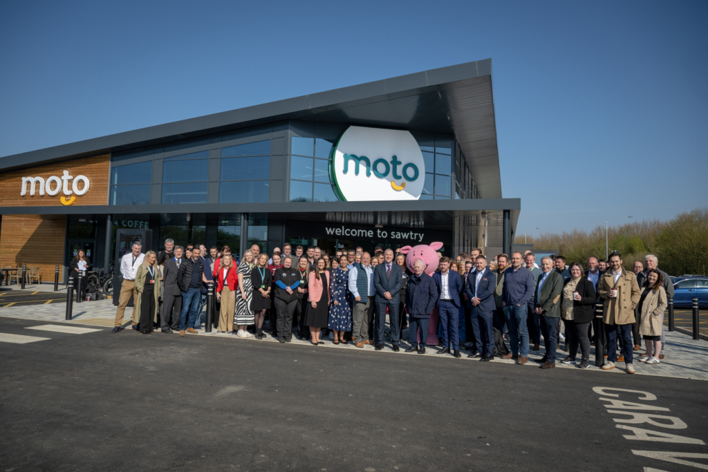 An image showing board members, colleagues and other significant people at in front of Moto Sawtry.